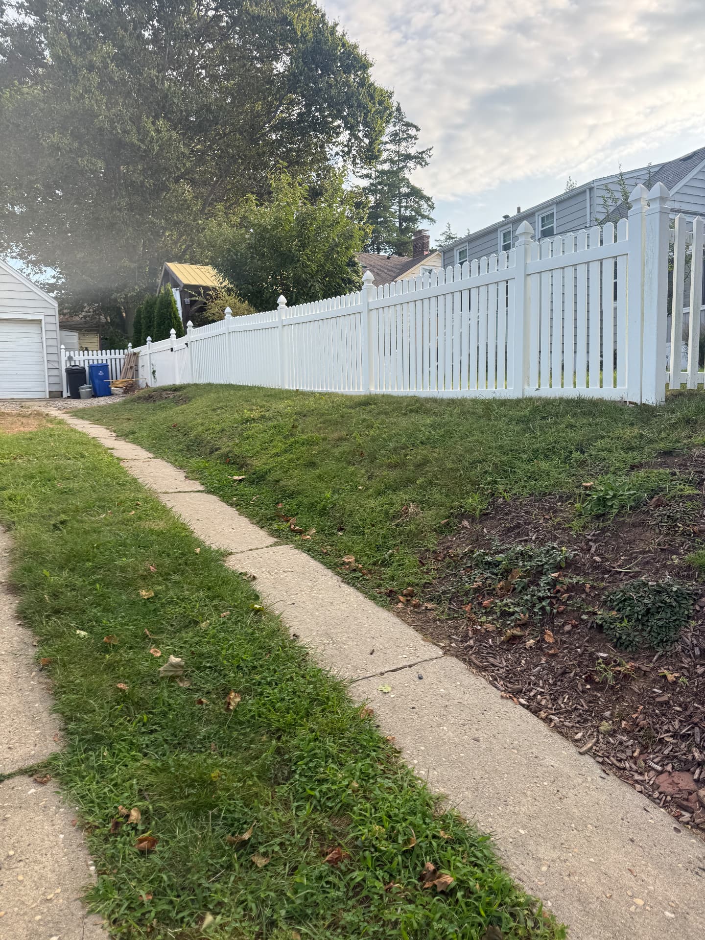 Yard before retaining wall installation